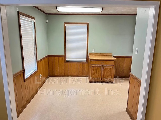 1750 Sea Isle Rd, Memphis, TN 38117 - unfurnished office featuring a wainscoted wall, wood walls, and ornamental molding