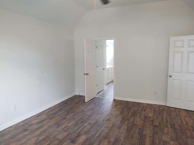 6386 Daybreak Dr, Bartlett, TN 38135 - empty room featuring vaulted ceiling, a ceiling fan, and dark wood-style flooring