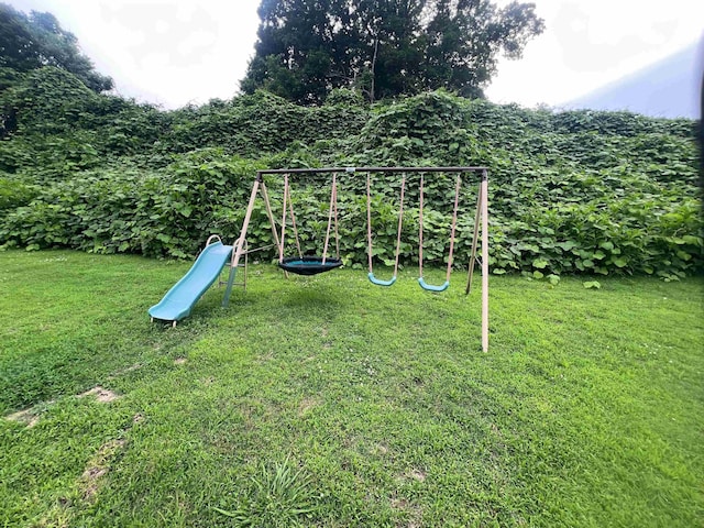 199 Bucksnort Rd, Covington, TN 38019 - view of playground featuring a yard