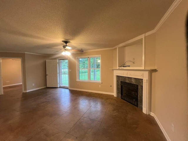 199 Bucksnort Rd, Covington, TN 38019 - unfurnished living room featuring crown molding, a ceiling fan, a tile fireplace, a textured ceiling, and dark tile patterned flooring