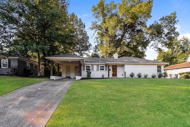 4143 Hilldale Ave, Memphis, TN 38117 - ranch-style house with a front lawn, a carport, and driveway