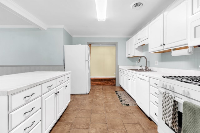 3024 Keats Rd, Bartlett, TN 38134 - kitchen featuring white appliances, ornamental molding, light countertops, and white cabinetry