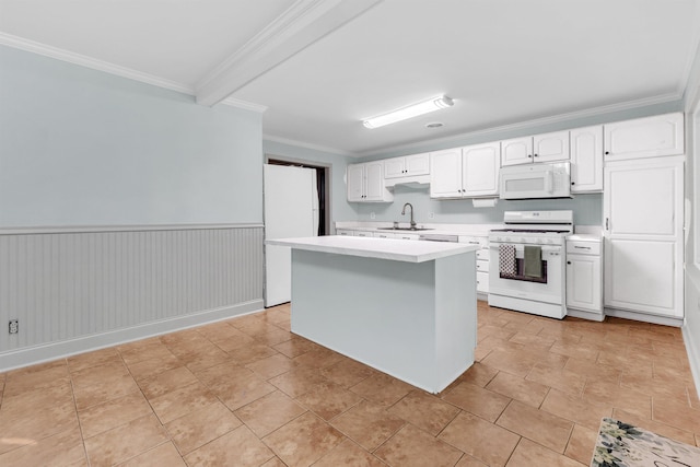 3024 Keats Rd, Bartlett, TN 38134 - kitchen featuring white appliances, light countertops, white cabinetry, crown molding, and a center island