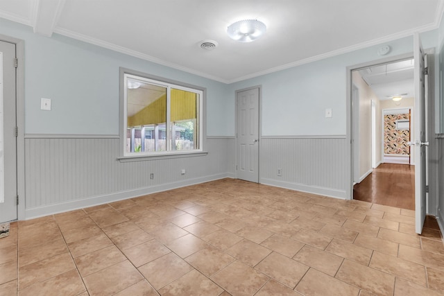 3024 Keats Rd, Bartlett, TN 38134 - unfurnished bedroom featuring a wainscoted wall, attic access, ornamental molding, and a closet