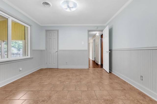 3024 Keats Rd, Bartlett, TN 38134 - spare room with a wainscoted wall and ornamental molding