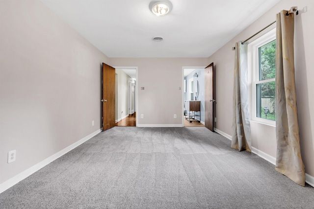 3024 Keats Rd, Bartlett, TN 38134 - unfurnished bedroom featuring carpet floors and baseboards