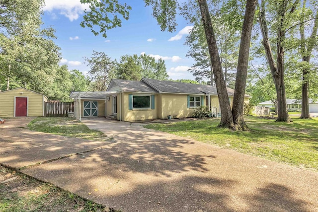 3024 Keats Rd, Bartlett, TN 38134 - view of front of property with driveway and a storage shed