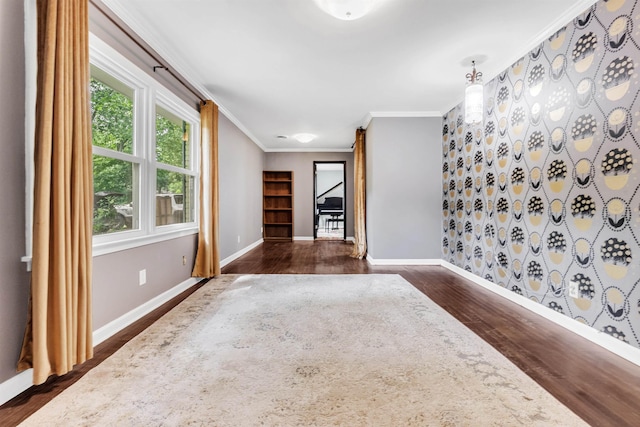3024 Keats Rd, Bartlett, TN 38134 - spare room featuring dark wood finished floors and ornamental molding