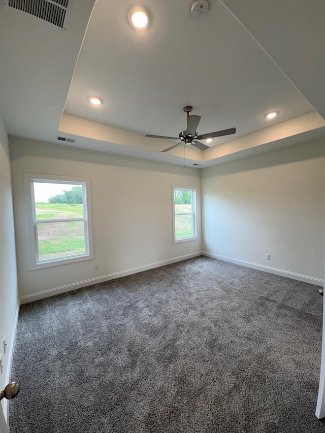 10289 March Meadows Way, Olive Branch, MS 38654 - carpeted empty room with a tray ceiling, a ceiling fan, a smoke detector, and recessed lighting