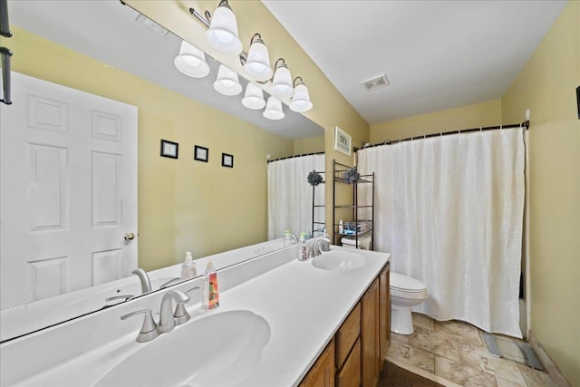 6806 Briarfield Ln, Bartlett, TN 38135 - bathroom with double vanity, a shower with shower curtain, and stone finish floors
