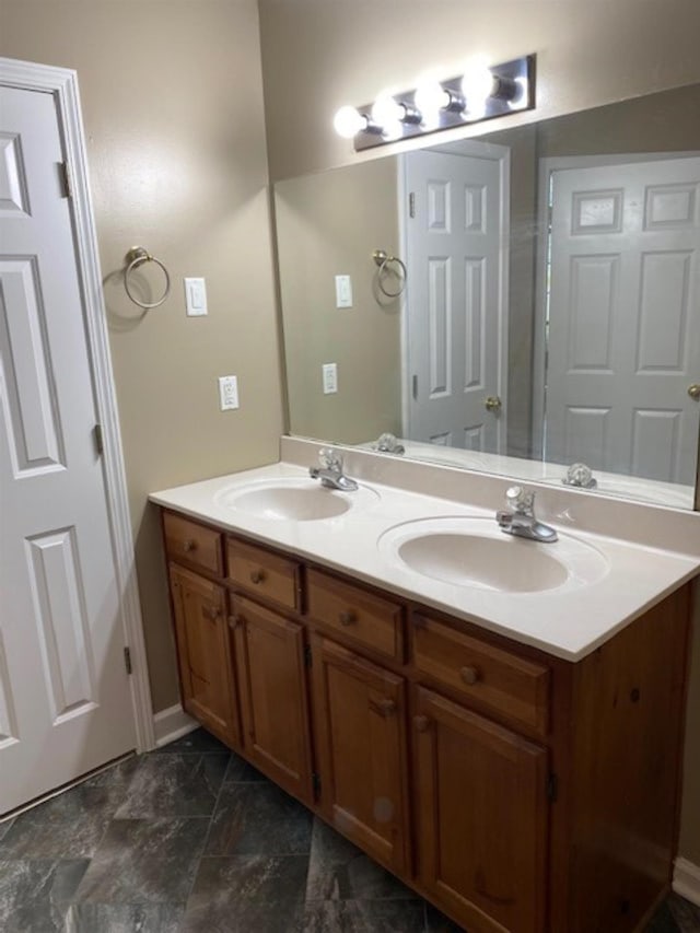 4769 Shadow View Ln, Bartlett, TN 38002 - bathroom with double vanity and baseboards