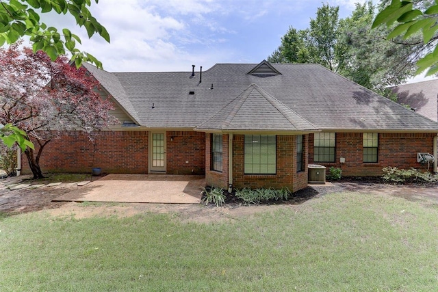 4769 Shadow View Ln, Bartlett, TN 38002 - rear view of property featuring a patio, a lawn, brick siding, and roof with shingles