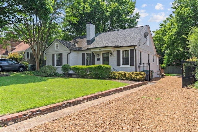 193 Alexander St, Memphis, TN 38111 - view of front of property with brick siding, a chimney, and a shingled roof