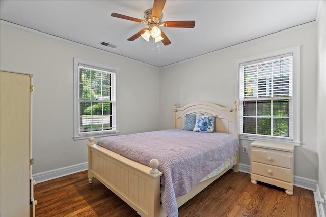 193 Alexander St, Memphis, TN 38111 - bedroom featuring multiple windows, crown molding, wood finished floors, and ceiling fan