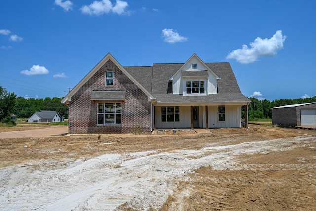 1710 Slocum Rd, Hernando, MS 38632 - view of front facade with roof with shingles