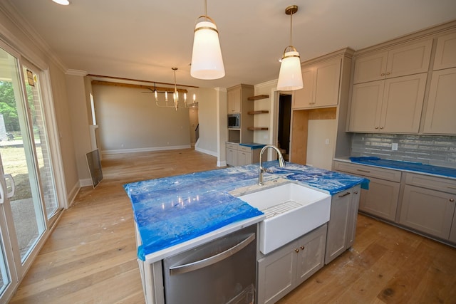 1710 Slocum Rd, Hernando, MS 38632 - kitchen with dishwasher, a chandelier, light wood-style floors, tasteful backsplash, and ornamental molding