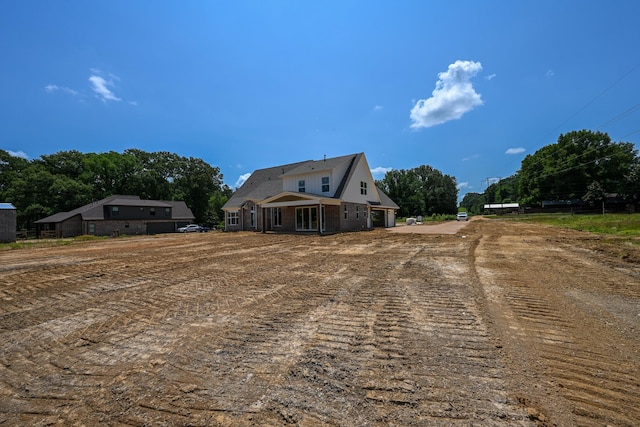 1710 Slocum Rd, Hernando, MS 38632 - view of front facade with dirt driveway