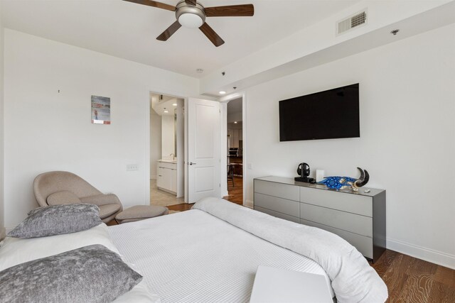 717 Riverside Dr Unit 1403, Memphis, TN 38103 - bedroom featuring wood finished floors, recessed lighting, ceiling fan, and ensuite bath