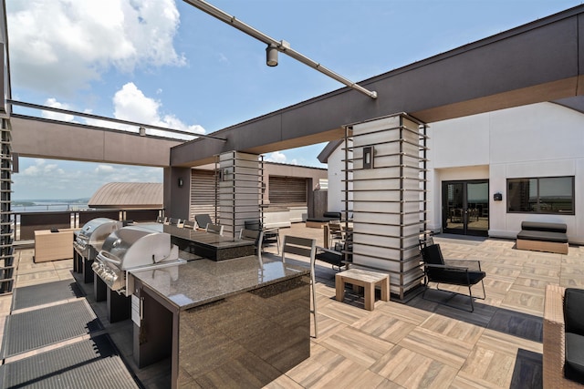 717 Riverside Dr Unit 1403, Memphis, TN 38103 - view of patio / terrace with area for grilling and an outdoor living space