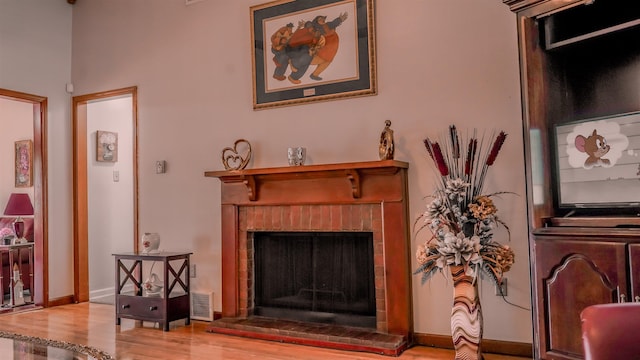 4431 Green Creek Dr, Memphis, TN 38125 - living area featuring a brick fireplace and wood finished floors