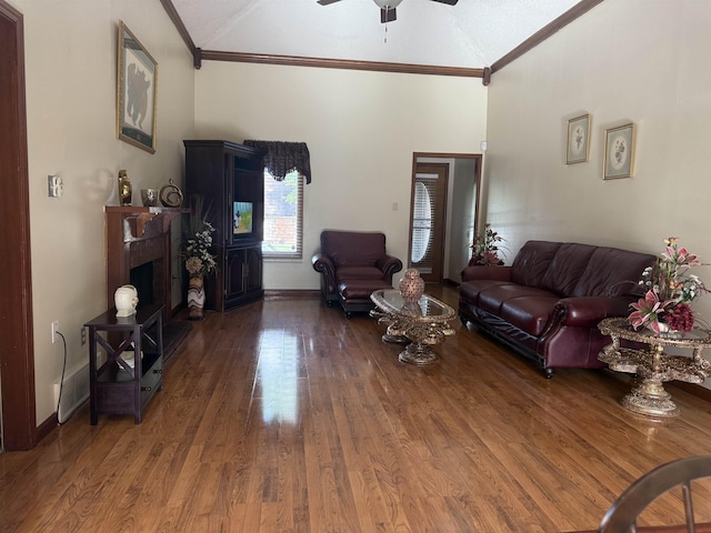 4431 Green Creek Dr, Memphis, TN 38125 - living area with ceiling fan, crown molding, wood finished floors, a fireplace, and high vaulted ceiling