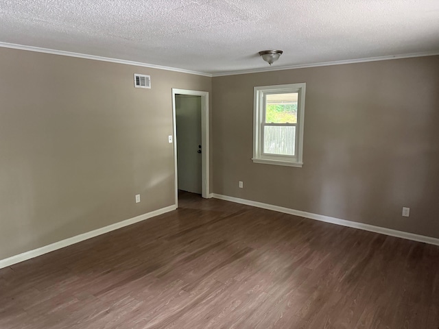 3413 Mountain Ter, Memphis, TN 38127 - empty room with dark wood-type flooring, ornamental molding, and a textured ceiling