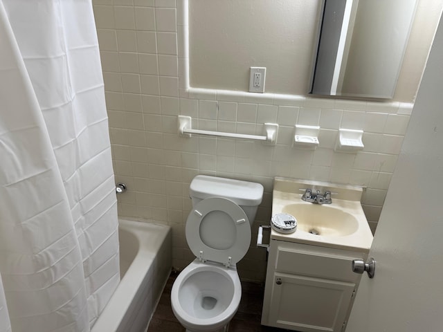 3413 Mountain Ter, Memphis, TN 38127 - full bathroom featuring vanity, tile walls, and shower / bath combo