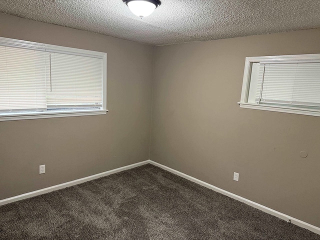 3413 Mountain Ter, Memphis, TN 38127 - unfurnished room featuring dark carpet and a textured ceiling