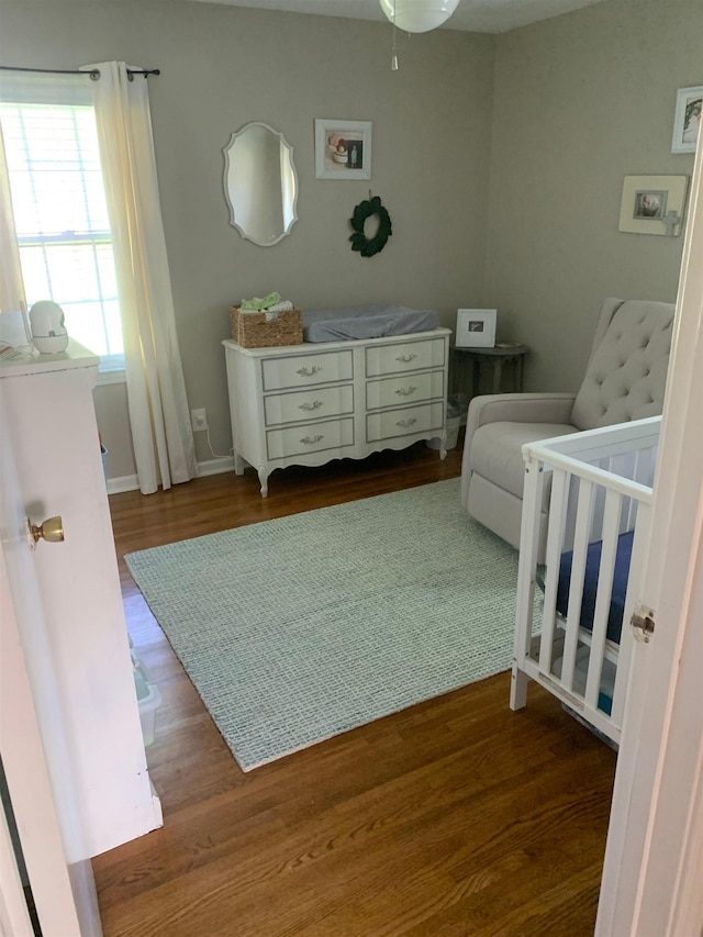 2526 Currywood Cv, Germantown, TN 38138 - bedroom with wood finished floors and a crib