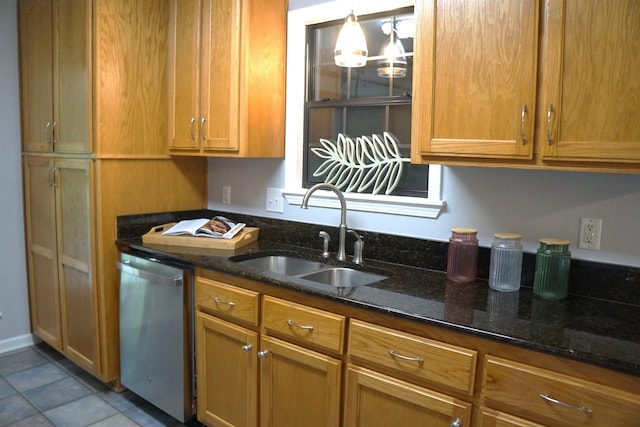 227 Lake Shore Dr, Munford, TN 38058 - kitchen featuring stainless steel dishwasher, dark stone countertops, pendant lighting, and brown cabinets