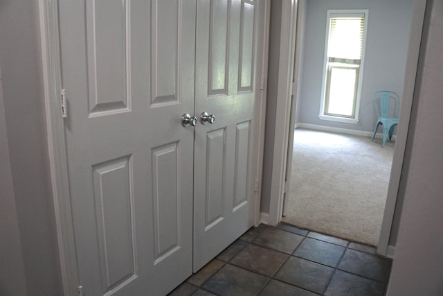 227 Lake Shore Dr, Munford, TN 38058 - hall featuring dark colored carpet and baseboards