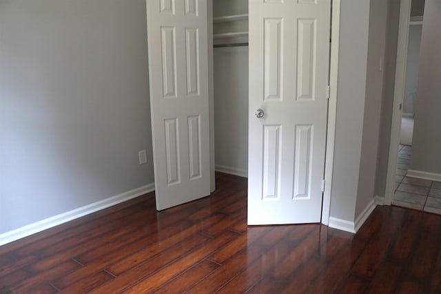 227 Lake Shore Dr, Munford, TN 38058 - unfurnished bedroom featuring wood finished floors and a closet