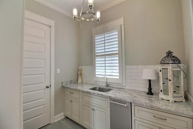 3181 Chapel Woods Cv, Germantown, TN 38139 - kitchen featuring stainless steel dishwasher, a chandelier, light stone countertops, ornamental molding, and tasteful backsplash