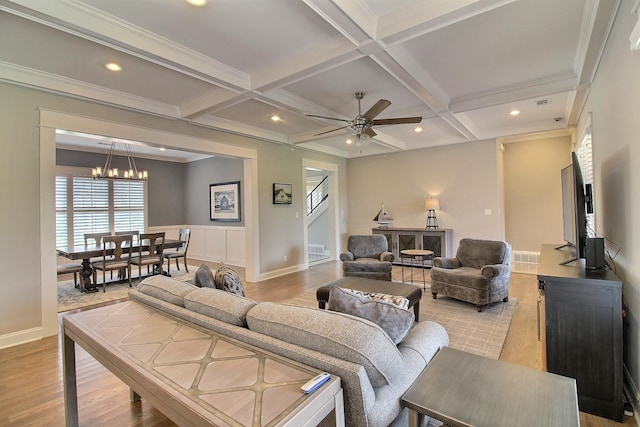 3181 Chapel Woods Cv, Germantown, TN 38139 - living area with a chandelier, light wood-style floors, coffered ceiling, beamed ceiling, and a ceiling fan