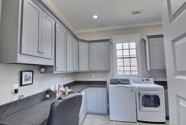 3181 Chapel Woods Cv, Germantown, TN 38139 - laundry area featuring washing machine and clothes dryer, cabinet space, ornamental molding, light tile patterned floors, and recessed lighting