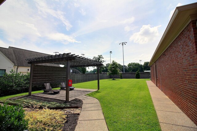 3181 Chapel Woods Cv, Germantown, TN 38139 - fenced backyard with a pergola and a patio