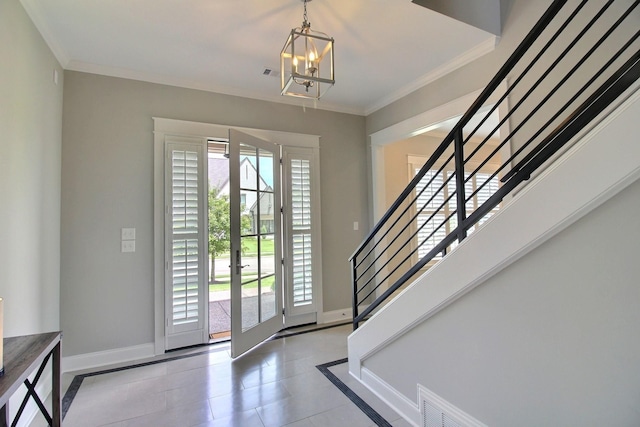 3181 Chapel Woods Cv, Germantown, TN 38139 - foyer with stairs, a chandelier, ornamental molding, and french doors