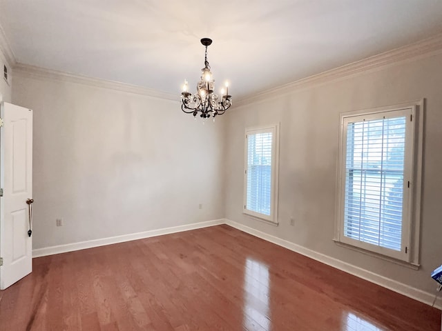 9168 Sycamore Creek Cv, Germantown, TN 38139 - unfurnished room featuring crown molding, a chandelier, and wood finished floors