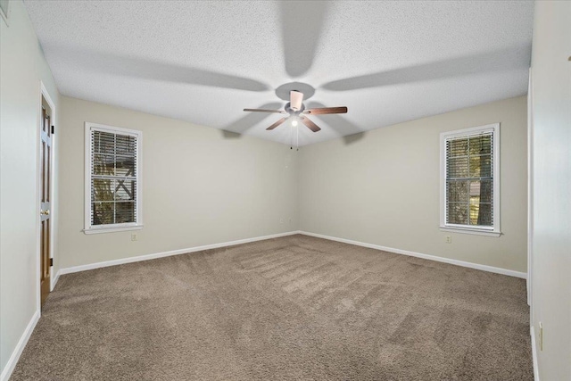 1425 Treehaven Cv, Memphis, TN 38016 - empty room with a ceiling fan, carpet, and a textured ceiling
