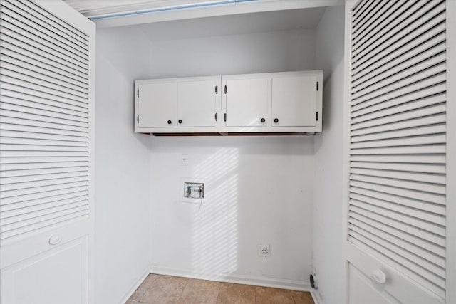 1425 Treehaven Cv, Memphis, TN 38016 - laundry area with cabinet space and washer hookup