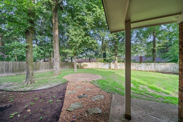1425 Treehaven Cv, Memphis, TN 38016 - fenced backyard with a patio area