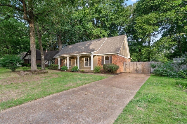 1425 Treehaven Cv, Memphis, TN 38016 - view of front of property with driveway, brick siding, and a shingled roof