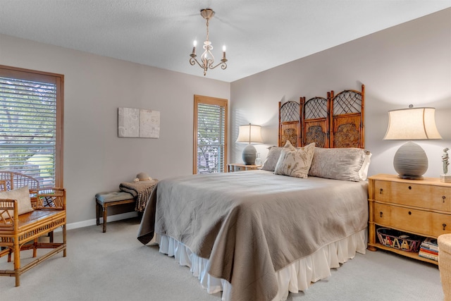 2016 Restington Ln Unit 2016, Memphis, TN 38119 - bedroom with a chandelier and light carpet