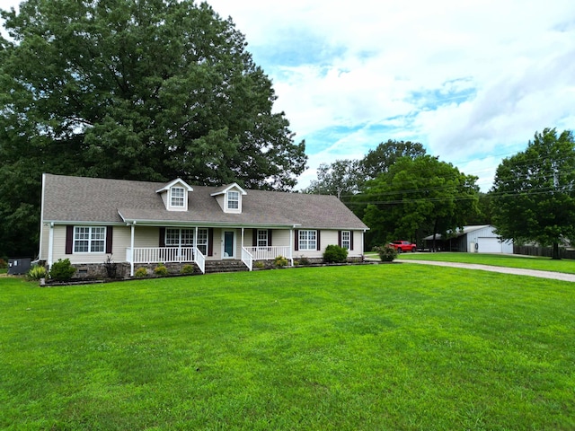 520 Jernigan Dr, Somerville, TN 38068 - cape cod home featuring covered porch and a front lawn
