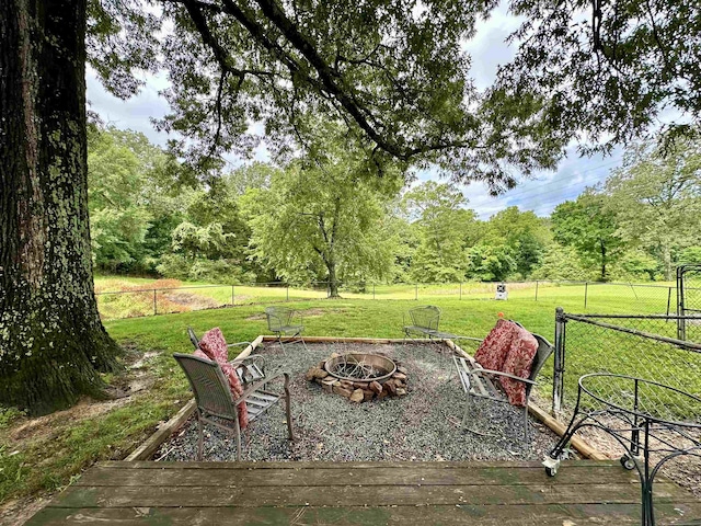 520 Jernigan Dr, Somerville, TN 38068 - view of yard featuring a fire pit and a view of trees