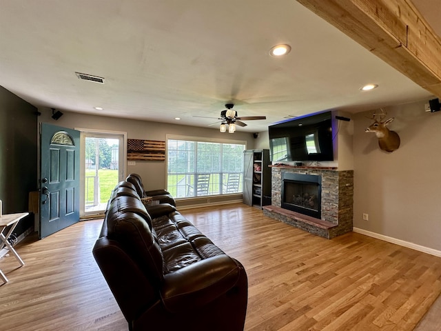 520 Jernigan Dr, Somerville, TN 38068 - living area with a stone fireplace, ceiling fan, light wood-style floors, and recessed lighting