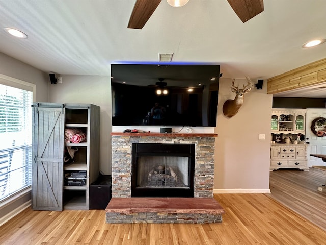520 Jernigan Dr, Somerville, TN 38068 - living area with a ceiling fan, wood finished floors, a fireplace, and recessed lighting