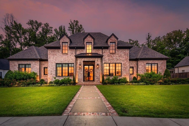 7066 Allelon Cir N, Germantown, TN 38138 - french country style house with a lawn, brick siding, and a shingled roof