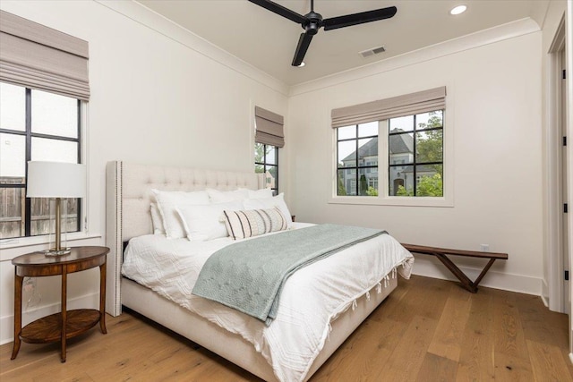 7066 Allelon Cir N, Germantown, TN 38138 - bedroom featuring light wood-type flooring, crown molding, recessed lighting, and ceiling fan