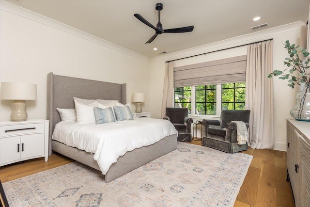 7066 Allelon Cir N, Germantown, TN 38138 - bedroom with wood finished floors, crown molding, recessed lighting, and ceiling fan